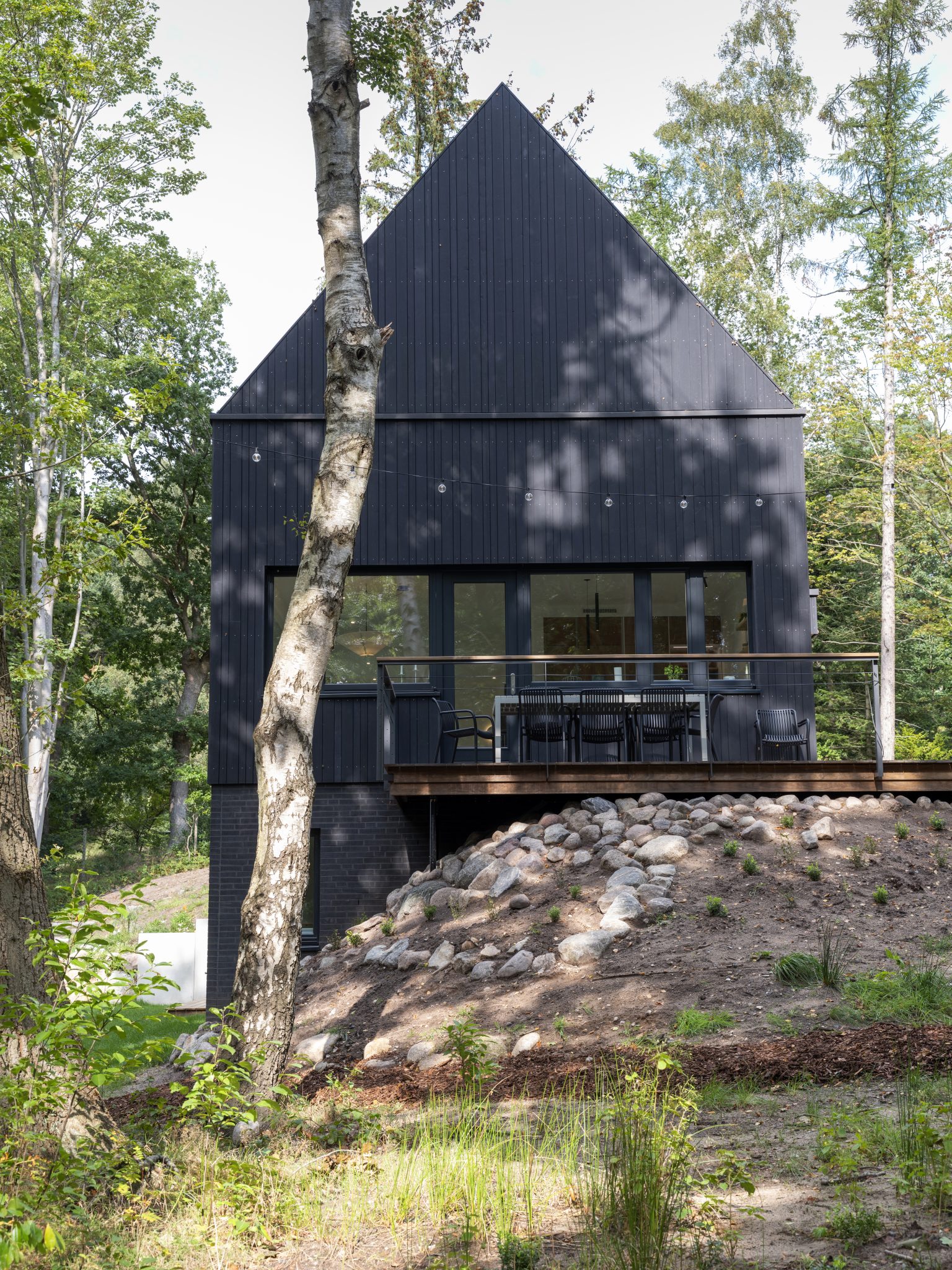 Maison à bardage Kebony noir, Warder